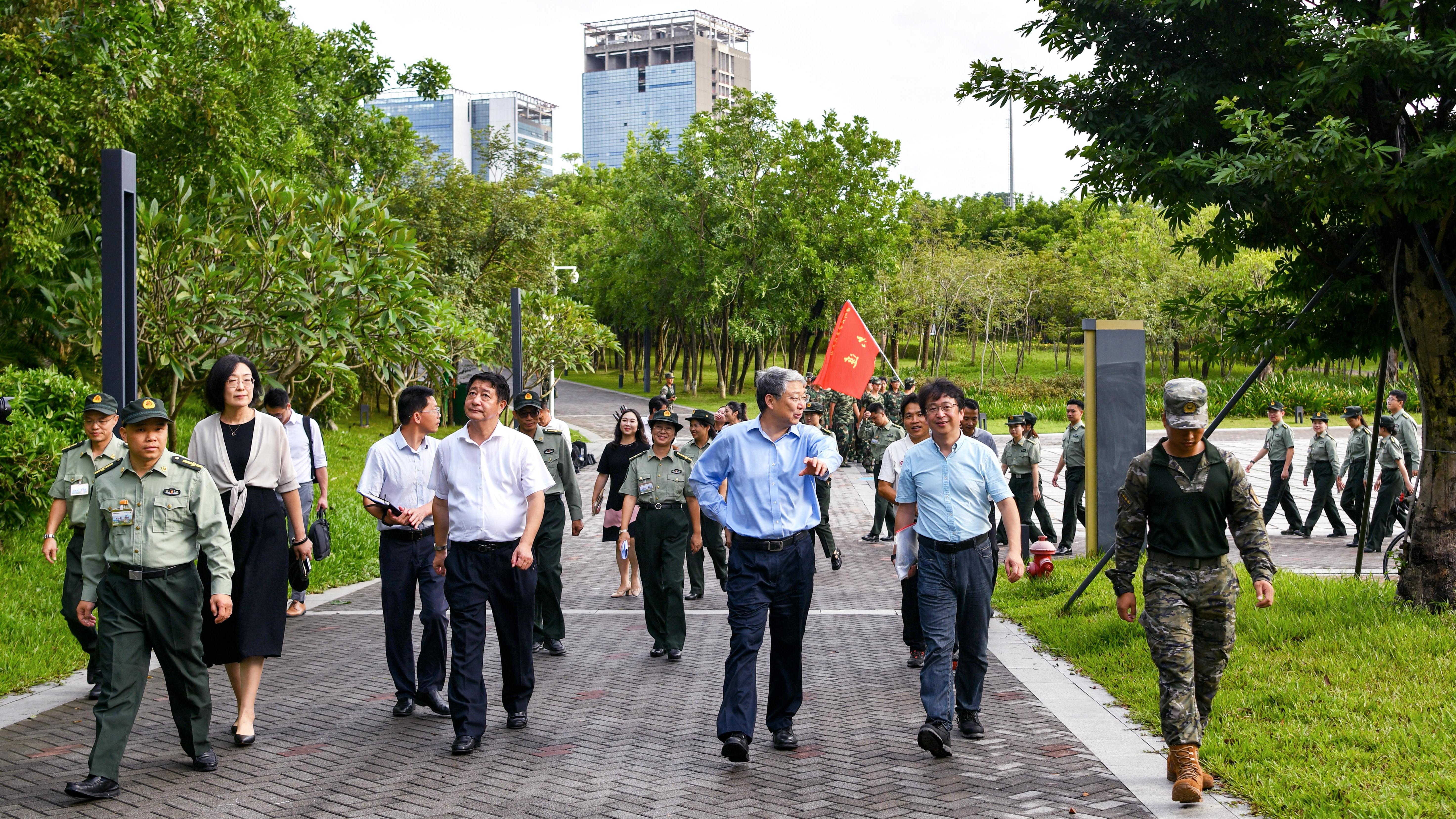 The school leader visited the military training freshmen